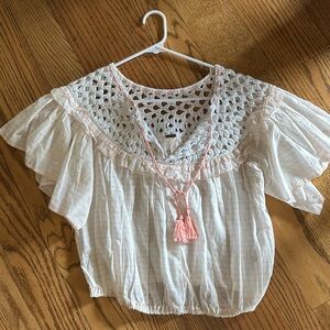 Free people crocheted ruffle top.
